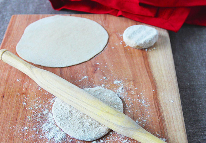 Rolling out roti flatbread