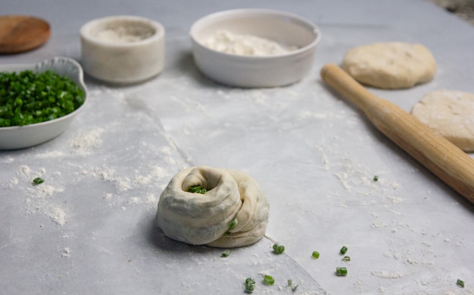 Chinese scallion pancakes rolled up like a spiral