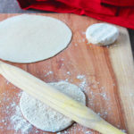 Rolling out roti flatbread