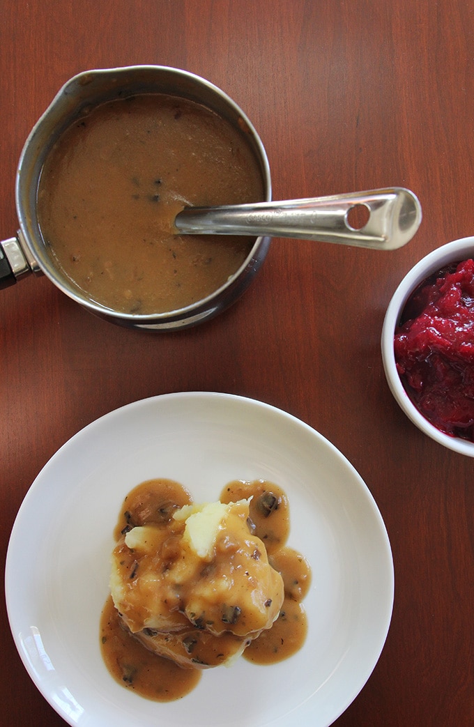 mashed potato and vegan gravy with cranberry sauce
