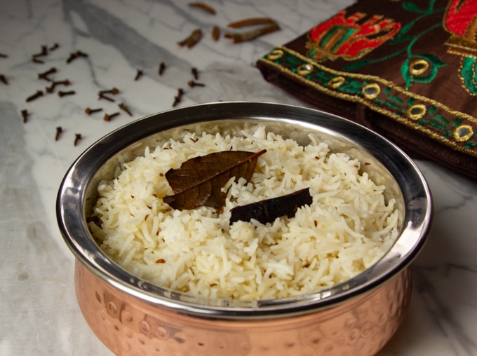 cumin rice in a serving dish