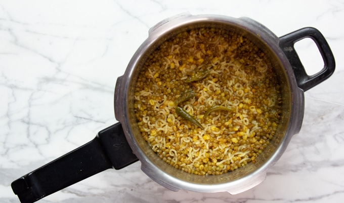 khichari with green chili on top