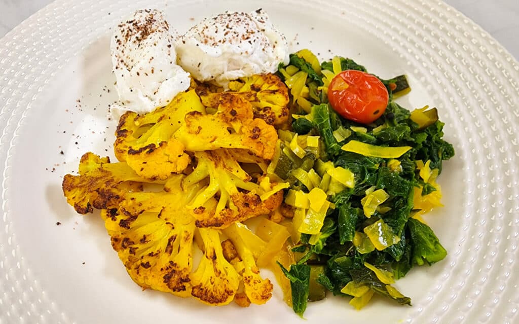 cauliflower steaks with greens and poached eggs